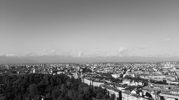 Turin, Italy - 07/02/2020: Travelling around North Italy. Beautiful caption of Turin wih sunny days and blue sky. Panoramic view to the city from Mole Antoneliana. Detailed photography of the old part