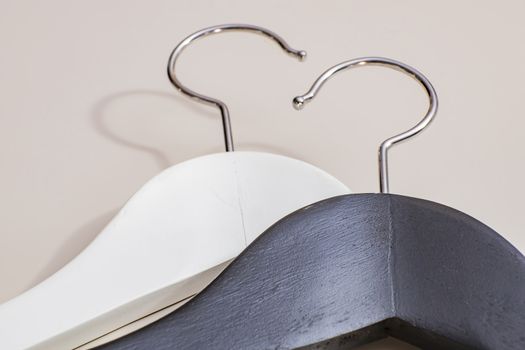 black and white wooden hangers