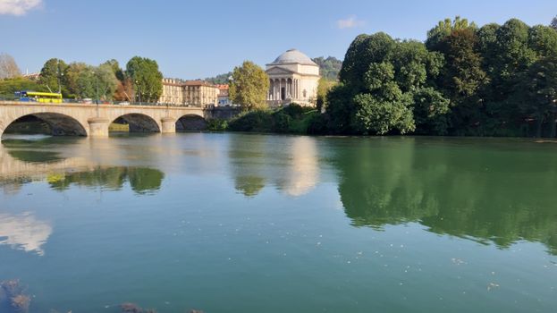 Turin, Italy - 07/02/2020: Travelling around North Italy. Beautiful caption of Turin wih sunny days and blue sky. Panoramic view to the city from Mole Antoneliana. Detailed photography of the old part