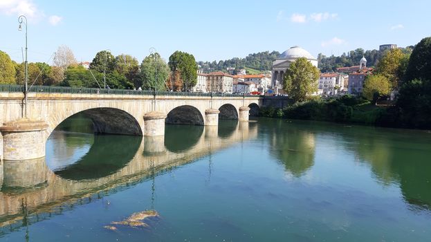 Turin, Italy - 07/02/2020: Travelling around North Italy. Beautiful caption of Turin wih sunny days and blue sky. Panoramic view to the city from Mole Antoneliana. Detailed photography of the old part