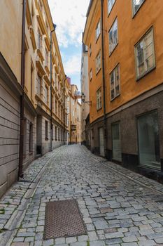 A vertical shot looking down a curving side street in Stockholm