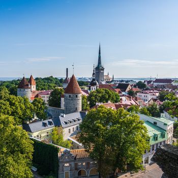 Tallinn, Estonia -- July 23, 2019. A photo looking down on Tallin from a limestone hill overlooking the town square.