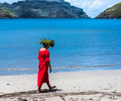 Nuku Hiva, French Polynesia -- March 23, 2018. Native tour guide walks on a beach in Nuku Hiva. Editorial Use Only.