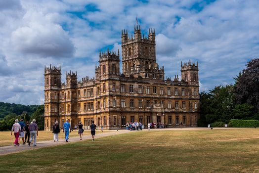 Newbury, England--July 18, 2018. Tour groups visit Highclere Castle, located on a 5,000 acre estate in Hampshire England. It is the location for shooting the PBS series Downton Abbey.