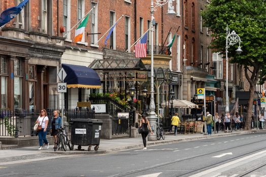 Dublin, Ireland--July 16, 2018. A busy commercial street with hotels, restaurants and shopping.