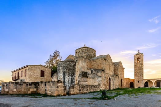 Saint apostle Barnabas monastery and the bell tower on the sunset, near Famagusta, North Cyprus