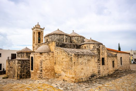 Agia Paraskevi old stone with domes and bell tower Byzantine Church in Geroskipou village, Cyprus