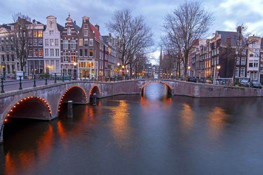 City scenic from Amsterdam at the Keizersgracht in the Netherlands at sunset