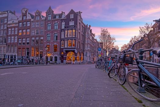City scenic from Amsterdam at the Singel in the Netherlands at sunset