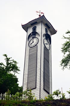 KOTA KINABALU, MY - JUNE 21: Atkinson clock tower on June 21, 2016 in Kota Kinabalu, Malaysia. Atkinson Clock Tower is the oldest standing structure in Kota Kinabalu. It sits in solitary along Signal Hill Road.