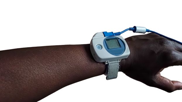 Sleep pulse oximeter worn on the arm of a black man, on a white background