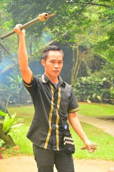 SABAH, MY - JUNE 21: Mari Mari Cultural Village tour guide on June 21, 2016 in Sabah, Malaysia. Mari Mari Village operates as a museum that preserves Borneo's knowledge, history,culture and tradition.
