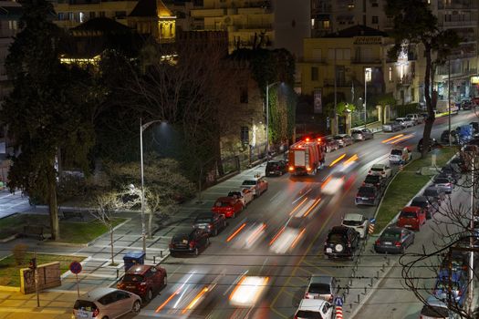Hellenic Fire Brigade vehicle on the street during a city fire in Thessaloniki, Greece.