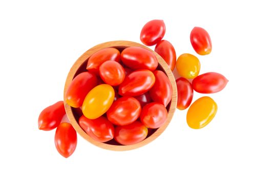 Fresh red cherry tomatoes in wood bowl, selective focus