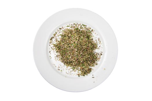 Mixed spice ingredient on a white plate cut out and isolated on a white background