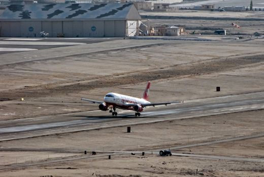 Leh, Jammu and Kashmir, India - June 26, 2011 : Kingfisher Airlines airbus A-320 # VT-DKR takes off from LehIXL