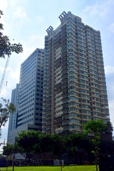 TAGUIG, PH- OCT. 1: Skyscraper building facade on October 1, 2016 in Bonifacio Global City, Taguig, Philippines. Bonifacio Global City is a financial district in Metro Manila, Philippines
