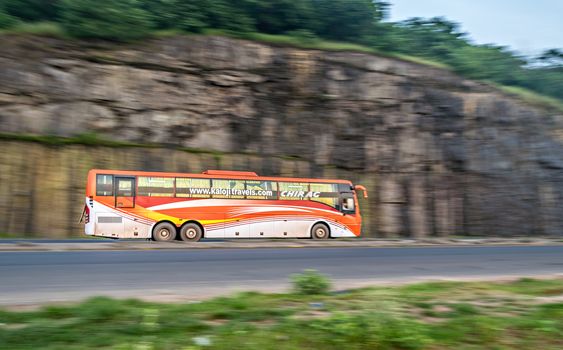 Pune, Maharashtra, India - September 26, 2017 : Chirag travels AC bus , speeding towards Mumbai on highway.