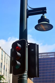 TAGUIG, PH-OCT. 1: Traffic light and night lamp on October 1, 2016 in Bonifacio Global City, Taguig, Philippines. 