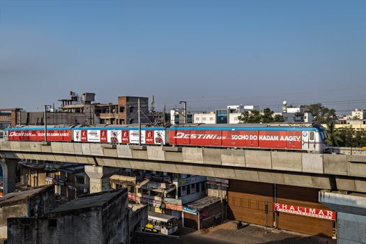 Rapid transit Hyderabad metro train enter Nampally station in the morning. The service has successfully completed one year in 2019