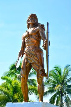 CEBU, PH - OCT. 8: Lapu Lapu Shrine on October 8, 2016 in Mactan Island, Cebu, Philippines. The Lapu Lapu shrine is a 20 meter bronze memorial statue erected on Mactan Island, Cebu, Philippines.