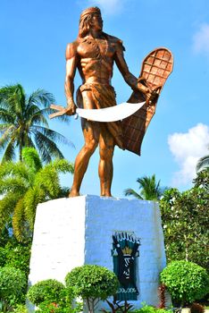 CEBU, PH - OCT. 8: Lapu Lapu Shrine on October 8, 2016 in Mactan Island, Cebu, Philippines. The Lapu Lapu shrine is a 20 meter bronze memorial statue erected on Mactan Island, Cebu, Philippines.