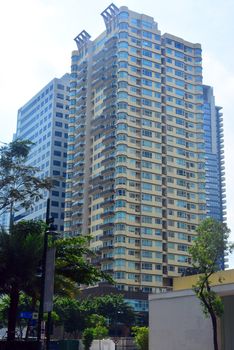 TAGUIG, PH- OCT. 1: Skyscraper building facade on October 1, 2016 in Bonifacio Global City, Taguig, Philippines. Bonifacio Global City is a financial district in Metro Manila, Philippines
