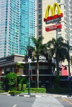 TAGUIG, PH - OCT. 1: McDonald's Forbes Town Center facade on October 1, 2016 in Forbes Town Center, Taguig City, Philippines. McDonald's is an American hamburger and fast food restaurant chain. It was founded in 1940.