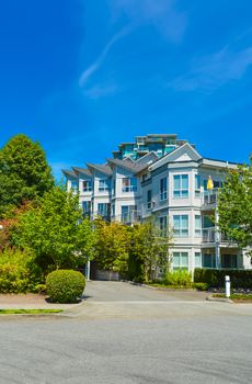 Modern apartment building on sunny day. Residential apartment building in Vancouver, British Columbia