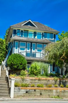 Residential house built up on land terrace in Vancouver, British Columbia