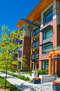 Brand new apartment building on sunny day in British Columbia, Canada