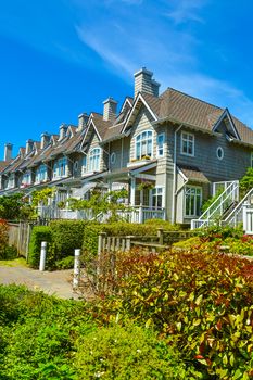 Residential townhouses on sunny day in Vancouver, British Columbia, Canada