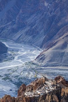 Famous indian tourist landmark Dhankar monastry perched on a cliff in Himalayas. Dhankar, Spiti Valley, Himachal Pradesh, India