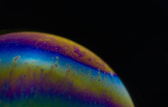 Structure texture soap bubble abstract black background.