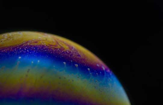 Structure texture soap bubble abstract black background.