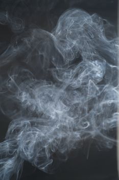 White smoke, curly black background, used as the background image.