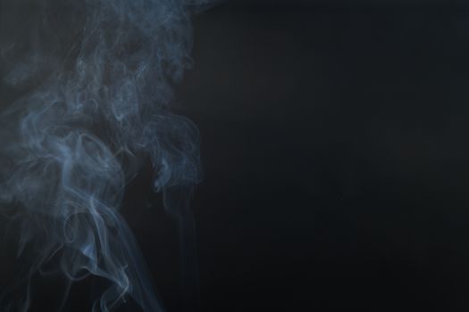 White smoke, black background, used as the background image.