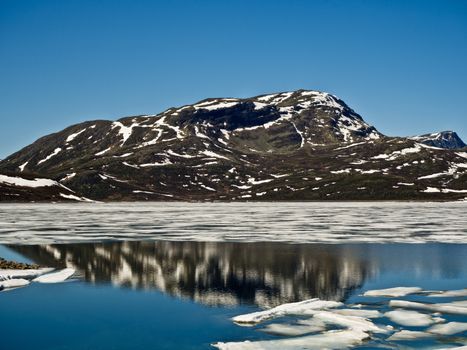 Nice blue sky, mountains and ice, Vavatn, Hemsedal, Norway