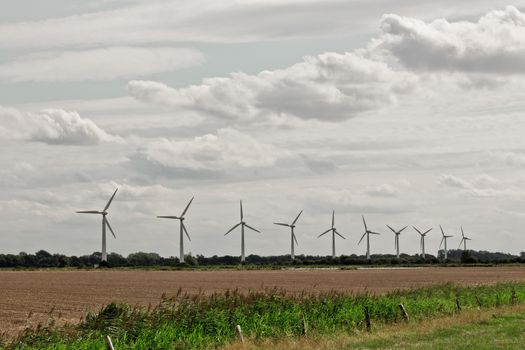 Typical landscape of northern Germany. Wind turbines wind energy landscapes.