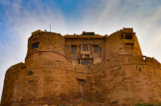 Golden city fort in Jaisalmer, Rajasthan, India. It is believed to be one of the very few "living forts" in the world, as nearly one fourth of the old city's population still resides within the fort.