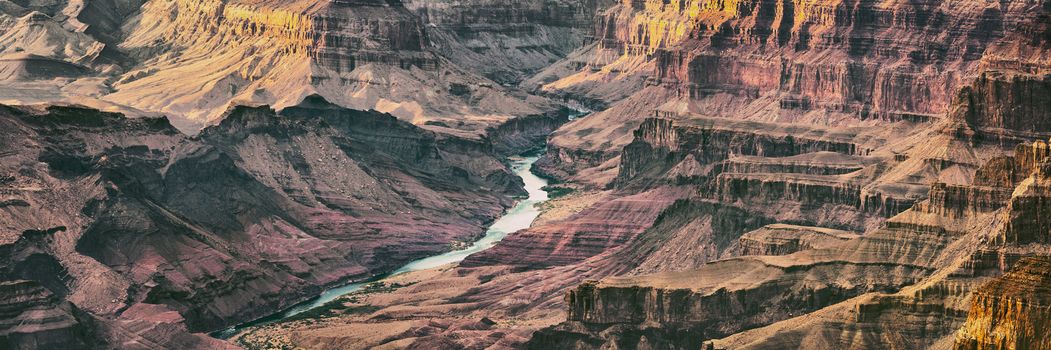 Grand Canyon panoramic banner background colorado river winding through.