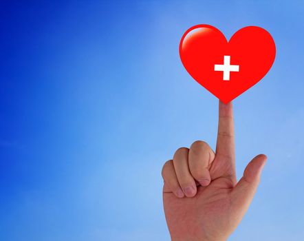 Health care and insurance concept, hand and red heart paper cut on blue background