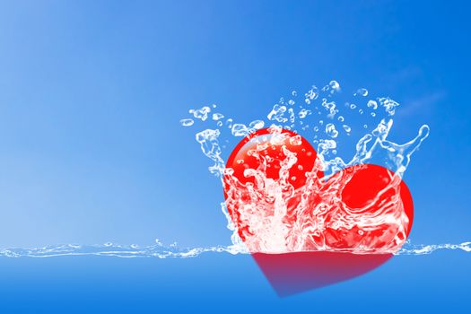 Love and valentine day concept, red heart faiing in the water