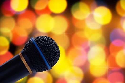 Microphone on blur bokeh background, music and concert concept