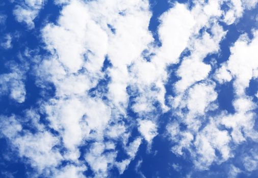 Fluffy cloud on clear blue sky, abstract background