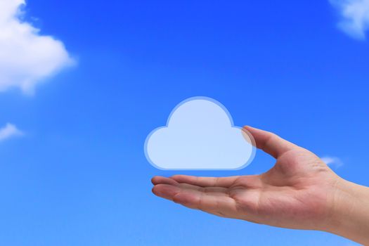 Cloud computing technology concept, hand on blue sky background, business connectivity with copy space