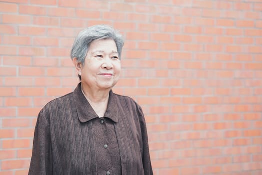 asian elder female woman resting relaxing at home. elderly senior leisure lifestyle