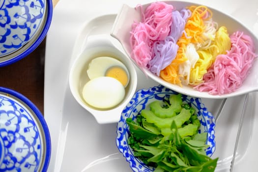 colorful Thai vermicelli with natural herbal color. rice noodle & vegetable