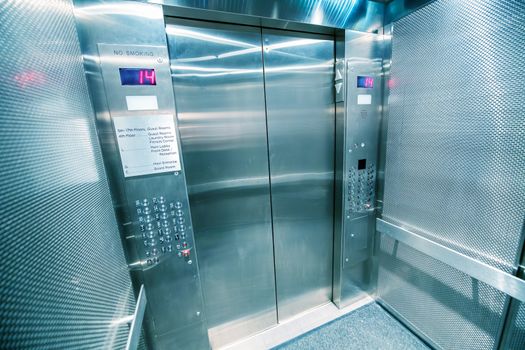 Metal large elevator of a subway station. Travel and public transportation concept.