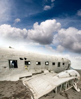 Abandoned wreckage of old aircraft on a beach
